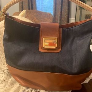 Talbots navy blue with rope style  shoulder strap.